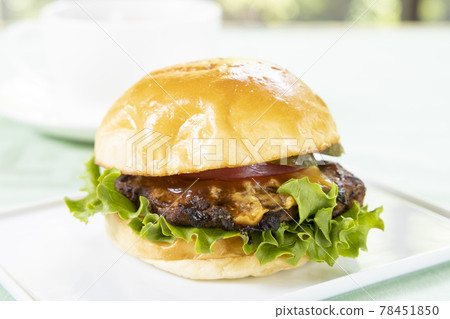 Delicious cheeseburger and hot coffee 78451850
