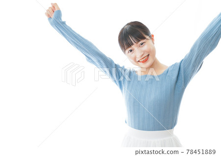 Rejoicing young woman Rejoicing young woman 78451889