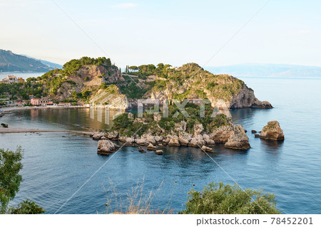 Isola Bella island near Taormina, Sicily, Italy Beautiful small island surrounded by azure waters of the Ionian Sea. Beauty in Sicily as a tourist attraction. Season on mediterranean sea. Isola Bella island near Taormina, Sicily, Italy Beautiful small island surrounded by azure waters of the Ionian Sea. Beauty in Sicily as a tourist attraction. Season on mediterranean sea. 78452201