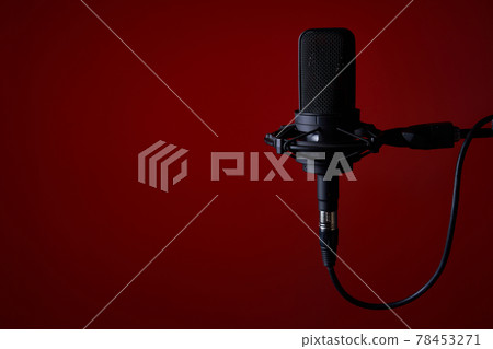 Black studio condenser microphone on red background, Black studio condenser microphone on red background, 78453271
