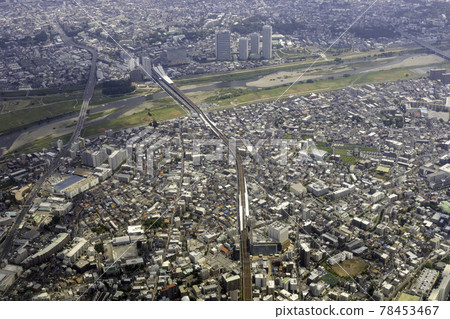 Aerial view of the direction of Futako Tamagawa Station from the sky above Takatsu Station on the Tokyu Denen-toshi Line 78453467