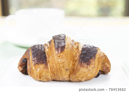 Delicious chocolate croissants and hot coffee 78453682