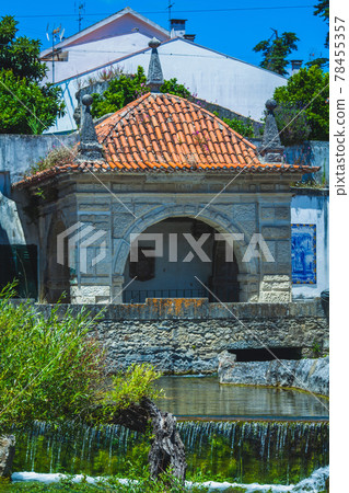 stone gazebo on the creek in an old portuguese village in summer stone gazebo on the creek in an old portuguese village in summer 78455357