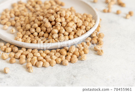 Plate of raw dry chickpea Plate of raw dry chickpea 78455961