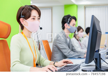 Staff working with masks and headsets Staff working with masks and headsets 78457198
