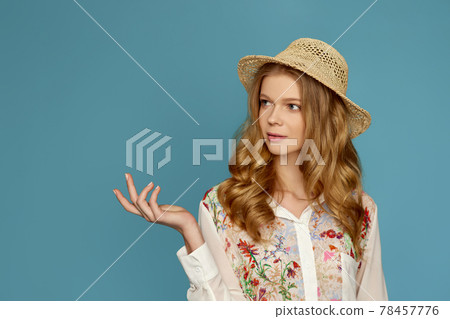 portrait of beautiful young blonde woman in straw hat portrait of beautiful young blonde woman in straw hat 78457776