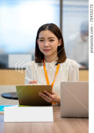 Image of a young woman at the reception (no plate name) Image of a young woman at the reception (no plate name) 78458278