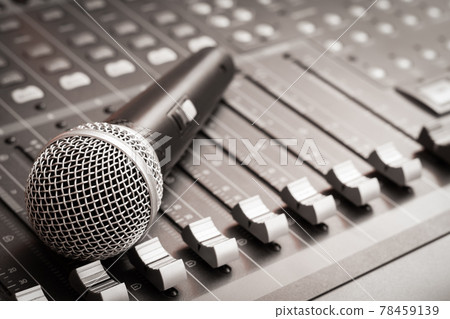 microphone on audio mixer. broadcasting, recording concept microphone on audio mixer. broadcasting, recording concept 78459139