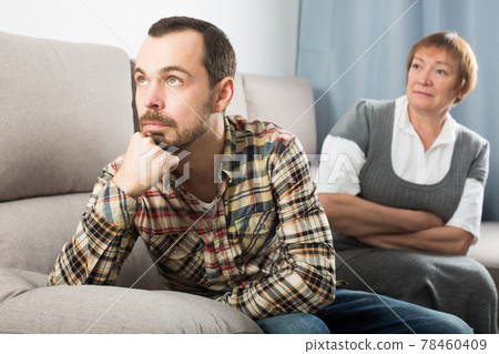 Mother and son arguing 78460409