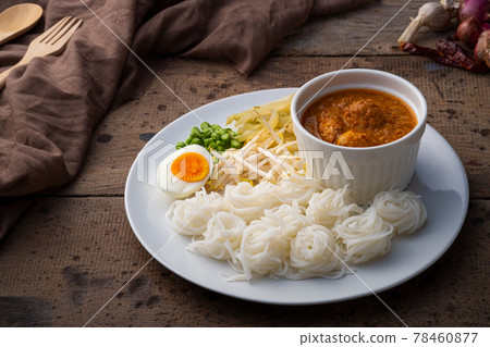 Rice noodles in fish curry sauce with meatball and vegetable (Kanom Jeen Nam Ya) Rice noodles in fish curry sauce with meatball and vegetable (Kanom Jeen Nam Ya) 78460877