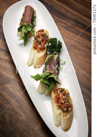mixed tapas plate with tomato bruschetta and serrano cured ham mixed tapas plate with tomato bruschetta and serrano cured ham 78461272