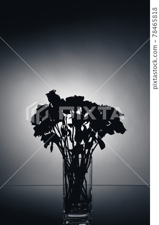 bouquet of dried roses silhouette, close-up view 78465818