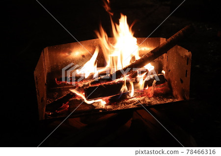 Bonfire on a wood grill 78466316