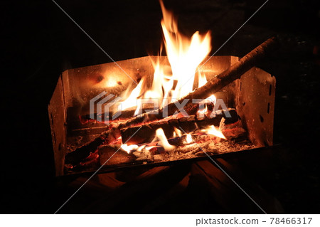 Bonfire on a wood grill 78466317