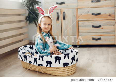 Cute little girl sitting at home 78468538