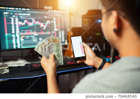 young trader holding USD dollar trading money exchange with crypto blockchain online young trader holding USD dollar trading money exchange with crypto blockchain online 78468540