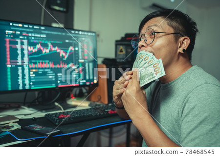 Trader man happiness enjoying with Crypto trade online make money with blockchain platform Trader man happiness enjoying with Crypto trade online make money with blockchain platform 78468545