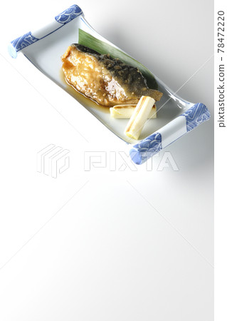 Photographed yellowtail teriyaki and grilled green onions with bamboo leaves on a white background 78472220