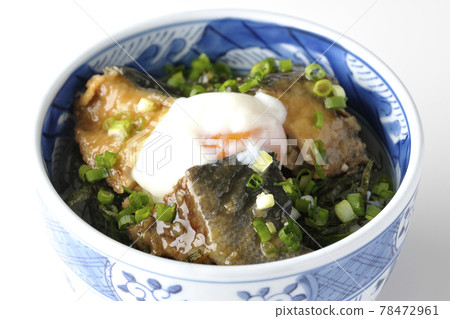 Photographed a teriyaki bowl of yellowtail topped with hot balls and plenty of small onions on a white background Photographed a teriyaki bowl of yellowtail topped with hot balls and plenty of small onions on a white background 78472961