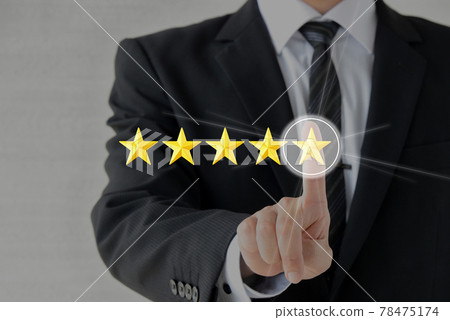 Businessman and star rating Businessman and star rating 78475174