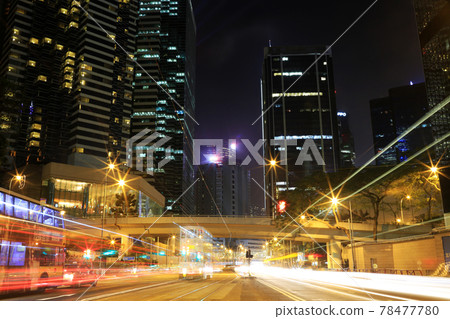 busy vehicle movement -downtown buildings in hong kong highway 78477780