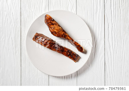 Salmon teriyaki fillet on a white plate 78479361