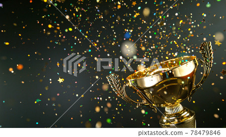Champion golden trophy isolated on black background. Concept of success and achievement. 78479846