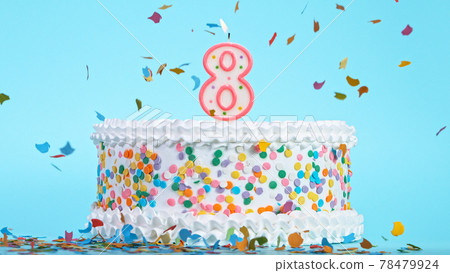 Colorful tasty birthday cake with candles shaped like the number 8. Colorful tasty birthday cake with candles shaped like the number 8. 78479924