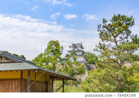 View of Akashi Castle's stone wall and turret in early summer from Musashi's garden under clear skies View of Akashi Castle's stone wall and turret in early summer from Musashi's garden under clear skies 78484199