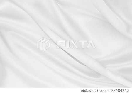 Smooth elegant white silk or satin luxury cloth texture as wedding background. Luxurious background design Smooth elegant white silk or satin luxury cloth texture as wedding background. Luxurious background design 78484242