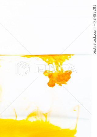 Yellow ink splashes into the water. Yellow ink splashes into the water. 78485293