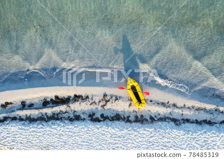 Yellow packraft rubber boat with red padle 78485319