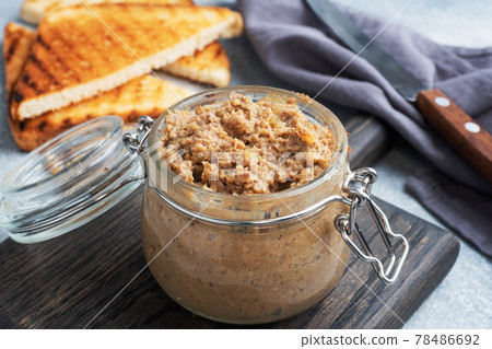 Homemade chicken liver pate in a glass jar. Homemade chicken liver pate in a glass jar. 78486692