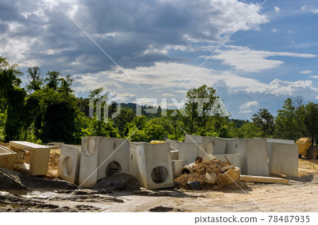 Construction of concrete pipe of drainage system work on the road for drained water sewer 78487935