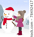 Girl making snowman that wearing a scarf in winter 78492417