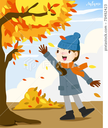 Girl walking in autumn leaves 78492423