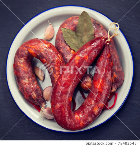 typical portuguese smoked sausages on beautiful white dish typical portuguese smoked sausages on beautiful white dish 78492545