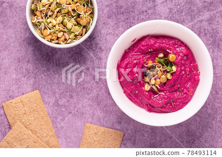 Roasted Beet Hummus in a bowl. Roasted Beet Hummus in a bowl. 78493114