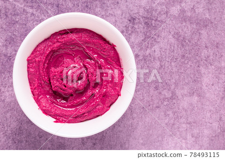 Roasted Beet Hummus in a bowl. Roasted Beet Hummus in a bowl. 78493115