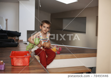 Little boy child playing with creative toys 78493446