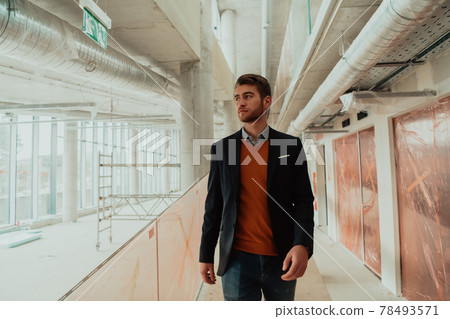 architect or businessman visiting construction site architect or businessman visiting construction site 78493571