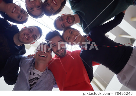 group of happy young people showing their unity 78495243