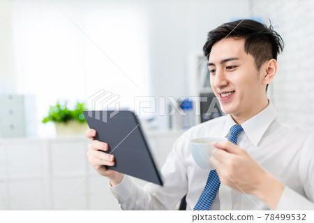 businessman read news with tablet businessman read news with tablet 78499532