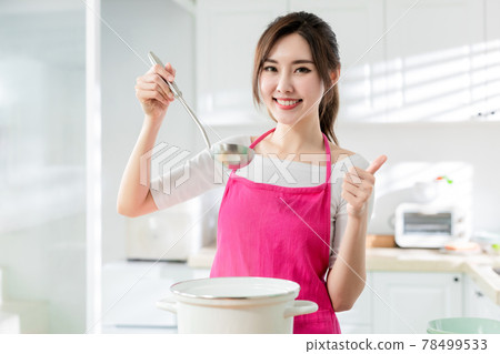 Asian housewife cook healthy meal Asian housewife cook healthy meal 78499533