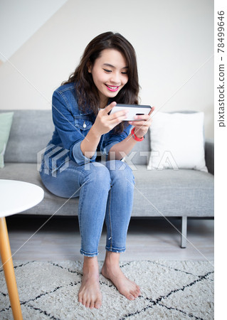 woman use smart phone 78499646