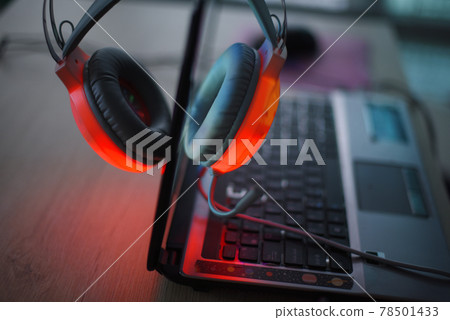 Headphones have a red light and computer Headphones have a red light and computer 78501433