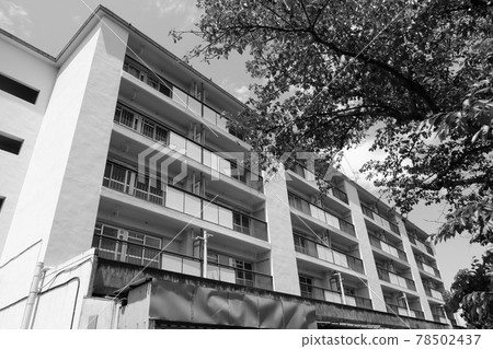 A ruined residential complex 78502437