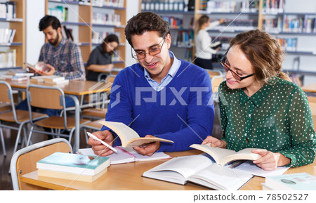 Students working in university library Students working in university library 78502527