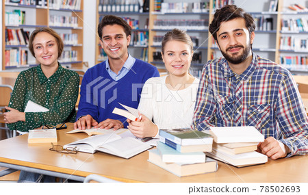 group of students preparing together for exam group of students preparing together for exam 78502693
