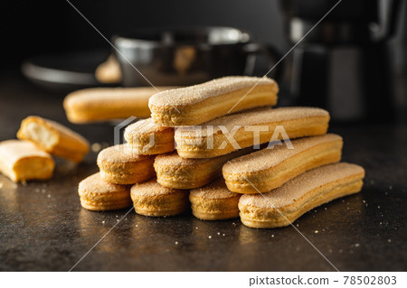 Italian cookie savoiardi. Sweet biscuits. Sponge cookies tiramisu. Italian cookie savoiardi. Sweet biscuits. Sponge cookies tiramisu. 78502803
